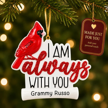Cardinal Memorial christmas ornament hanging on a lit Christmas tree with a Made Just For You gift tag