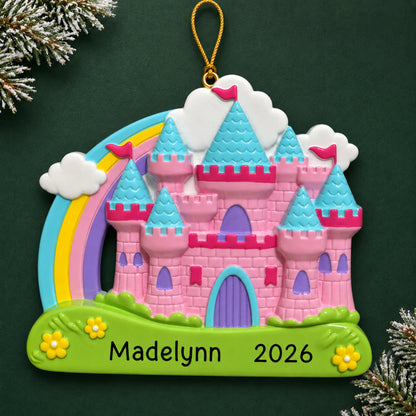 Personalized princess rainbow castle christmas ornament on a dark green pine background