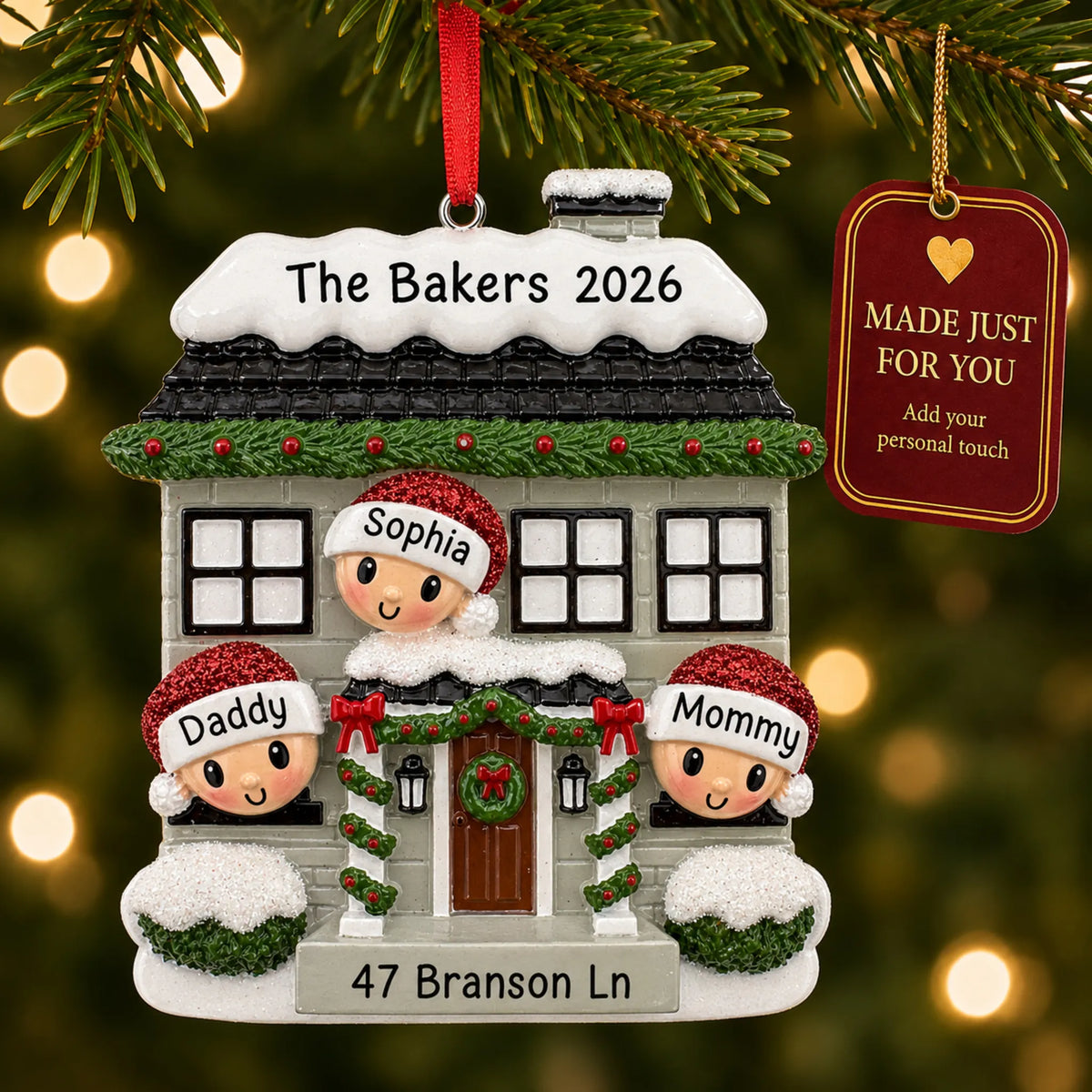 New home family of 3 christmas ornament hanging on a lit Christmas tree with a Made Just For You gift tag