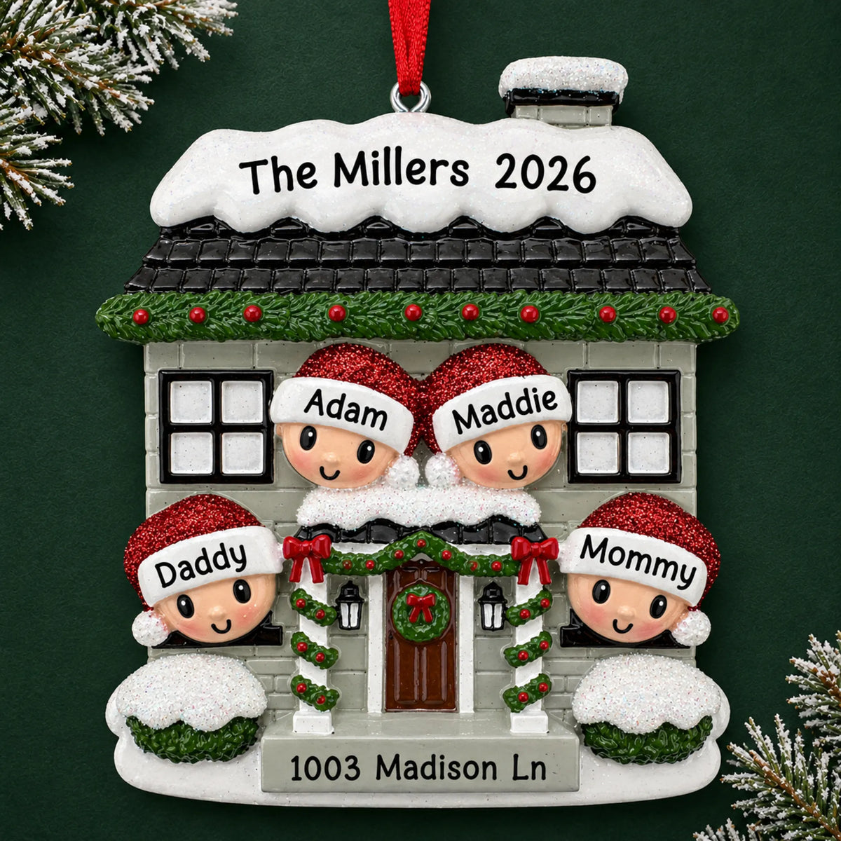 Personalized new home family of 4 christmas ornament on a dark green pine background