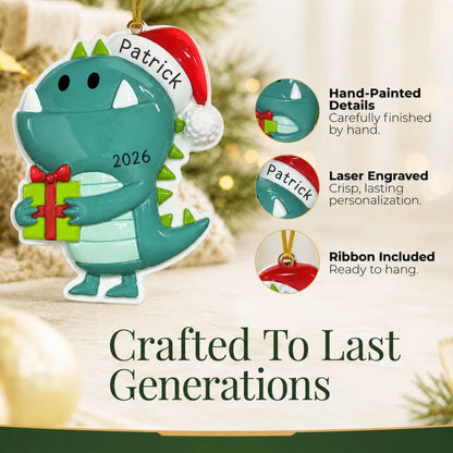 Hand-painted details and laser engraved personalization on the christmas monster ornament, ribbon included