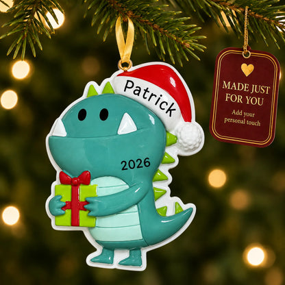 Christmas monster ornament hanging on a lit Christmas tree with a Made Just For You gift tag