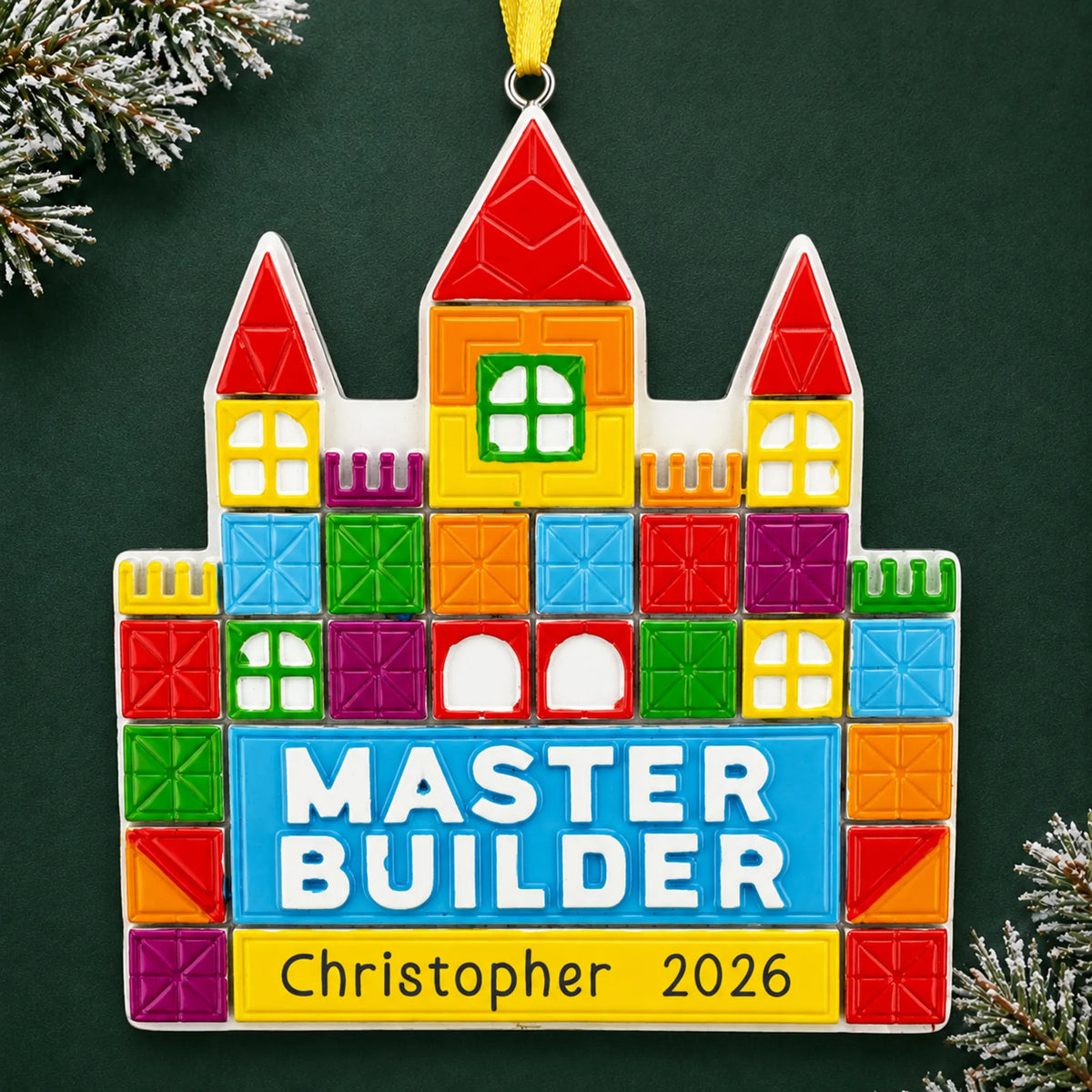 Personalized master tile builder christmas ornament on a dark green pine background