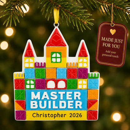 Master tile builder christmas ornament hanging on a lit Christmas tree with a Made Just For You gift tag