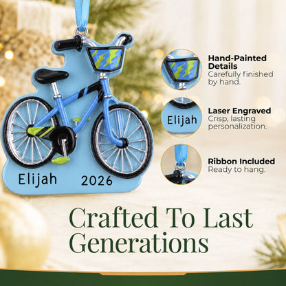Hand-painted details and laser engraved personalization on the boy's first bike christmas ornament, ribbon included