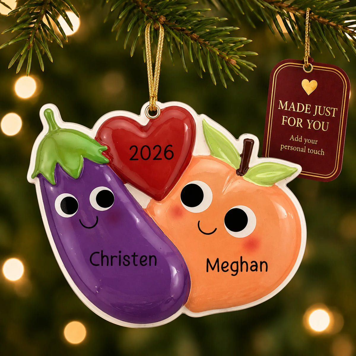 Eggplant & Peach christmas ornament hanging on a lit Christmas tree with a Made Just For You gift tag