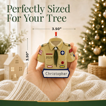 Size guide: the personalized boy scout christmas ornament shown in hand next to a Christmas tree