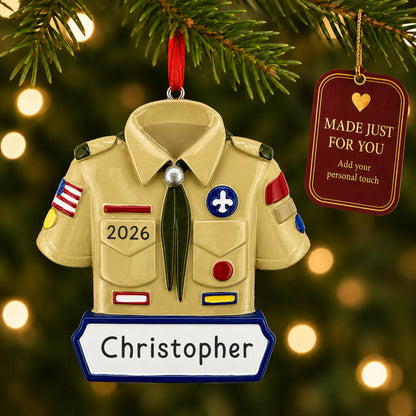 Boy scout christmas ornament hanging on a lit Christmas tree with a Made Just For You gift tag