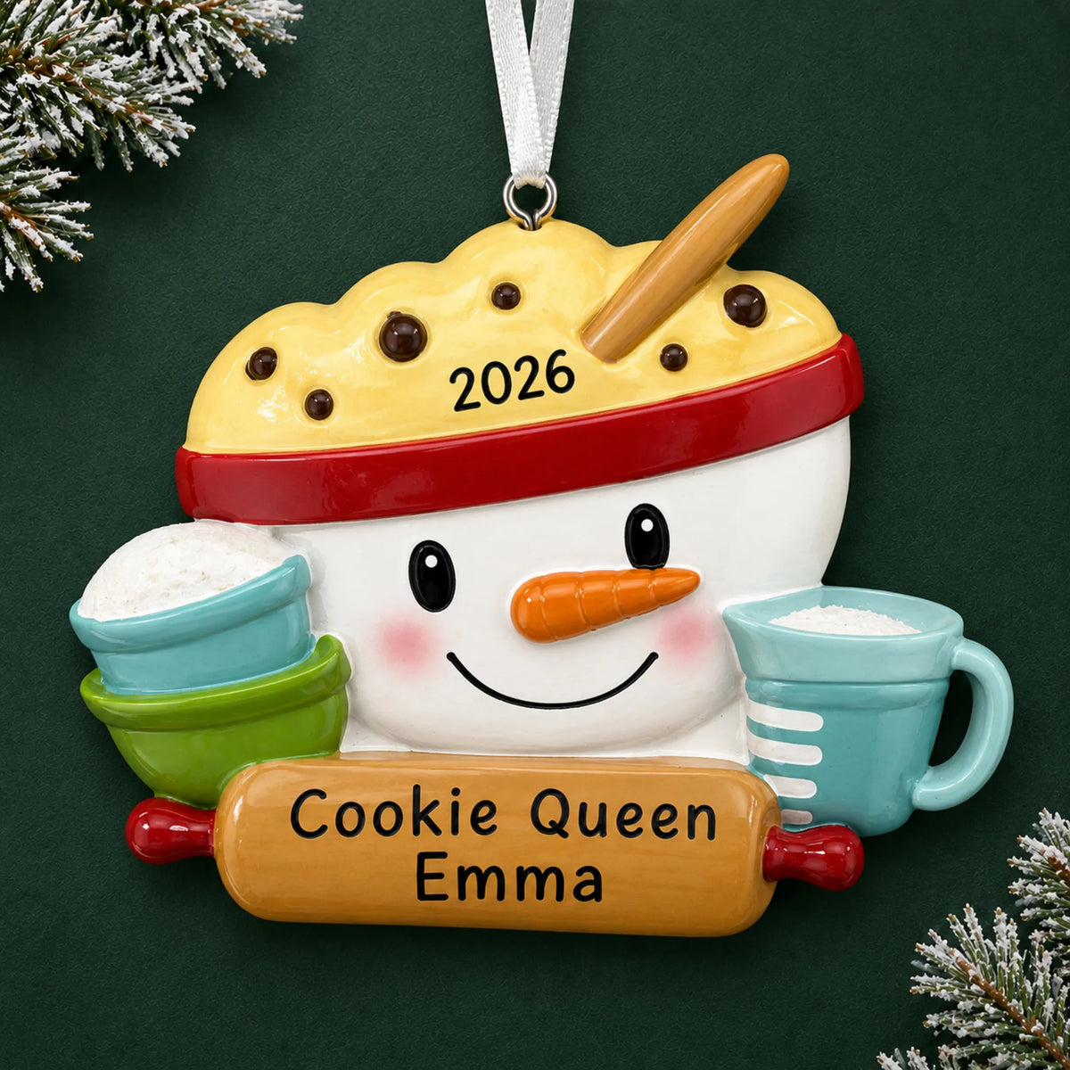 Personalized baking measuring cups christmas ornament on a dark green pine background
