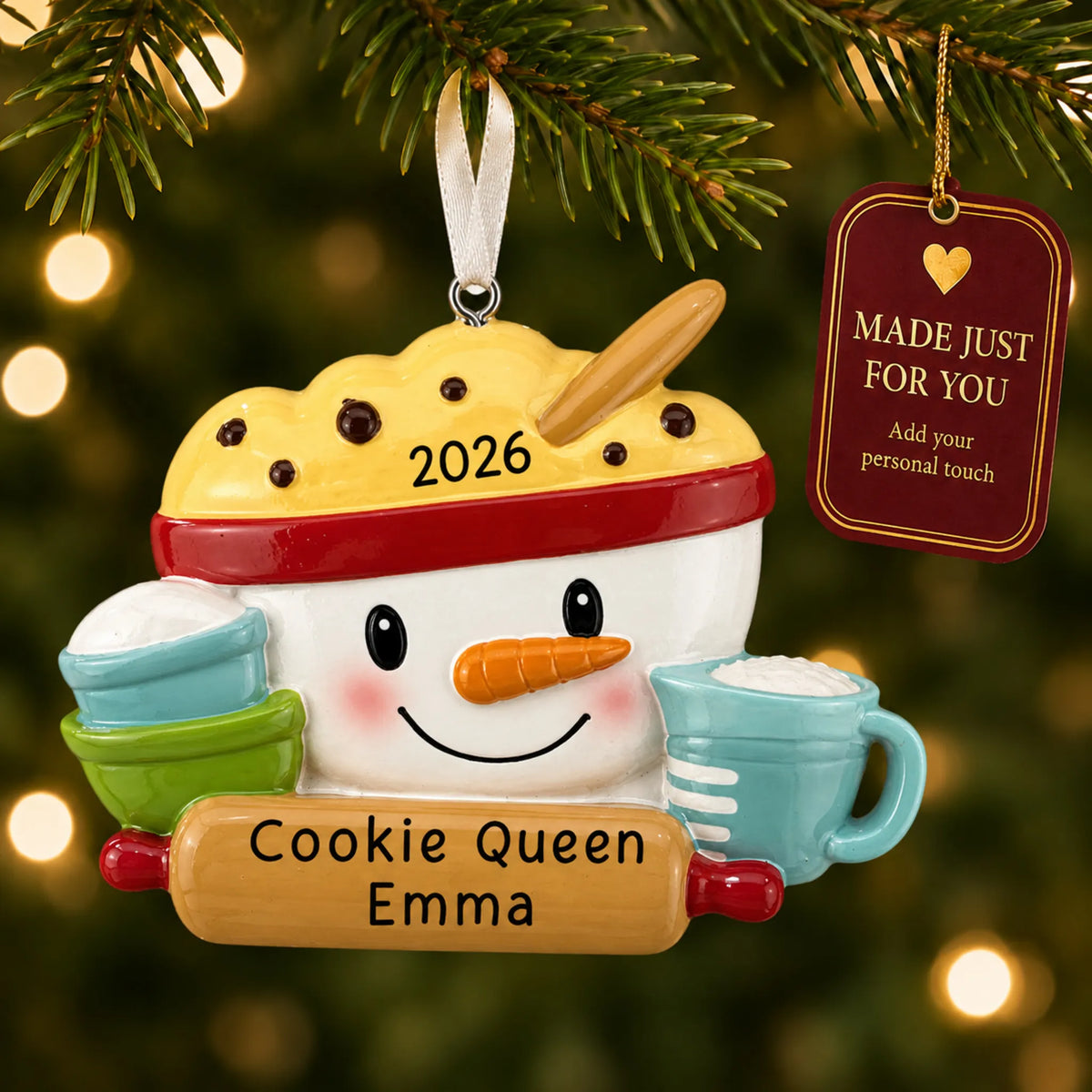 Baking measuring cups christmas ornament hanging on a lit Christmas tree with a Made Just For You gift tag