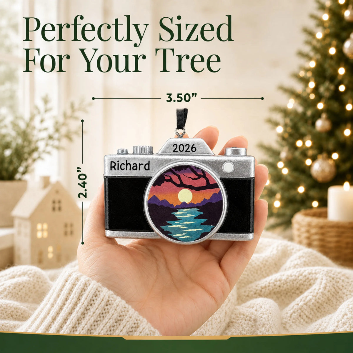 Size guide: the personalized dslr camera christmas ornament is 3.50 in wide by 2.40 in tall, shown in hand