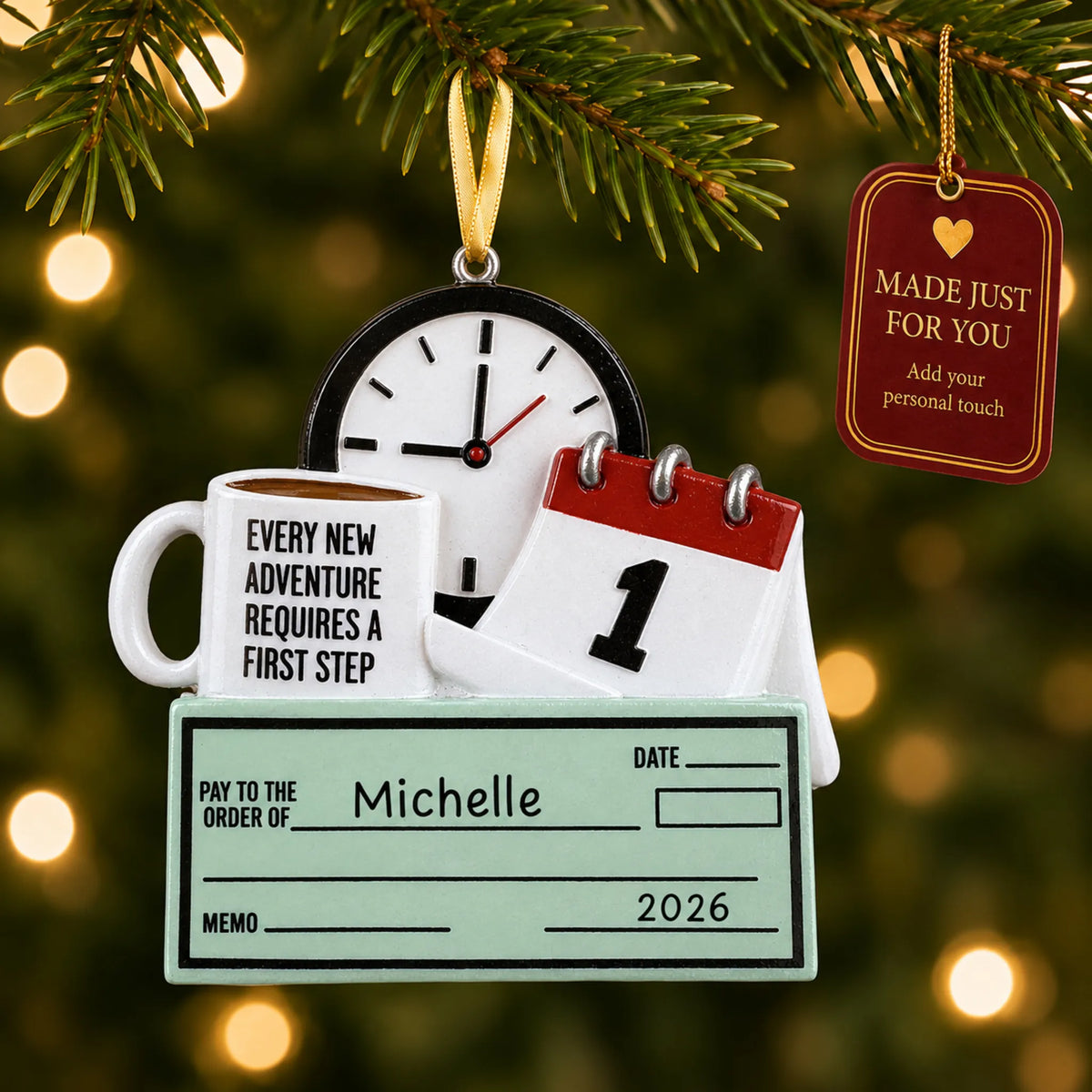 First job paycheck christmas ornament hanging on a lit Christmas tree with a Made Just For You gift tag