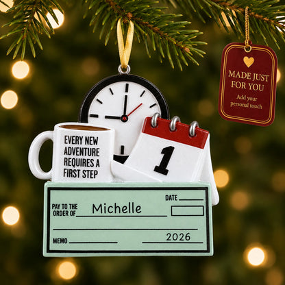 First job paycheck christmas ornament hanging on a lit Christmas tree with a Made Just For You gift tag