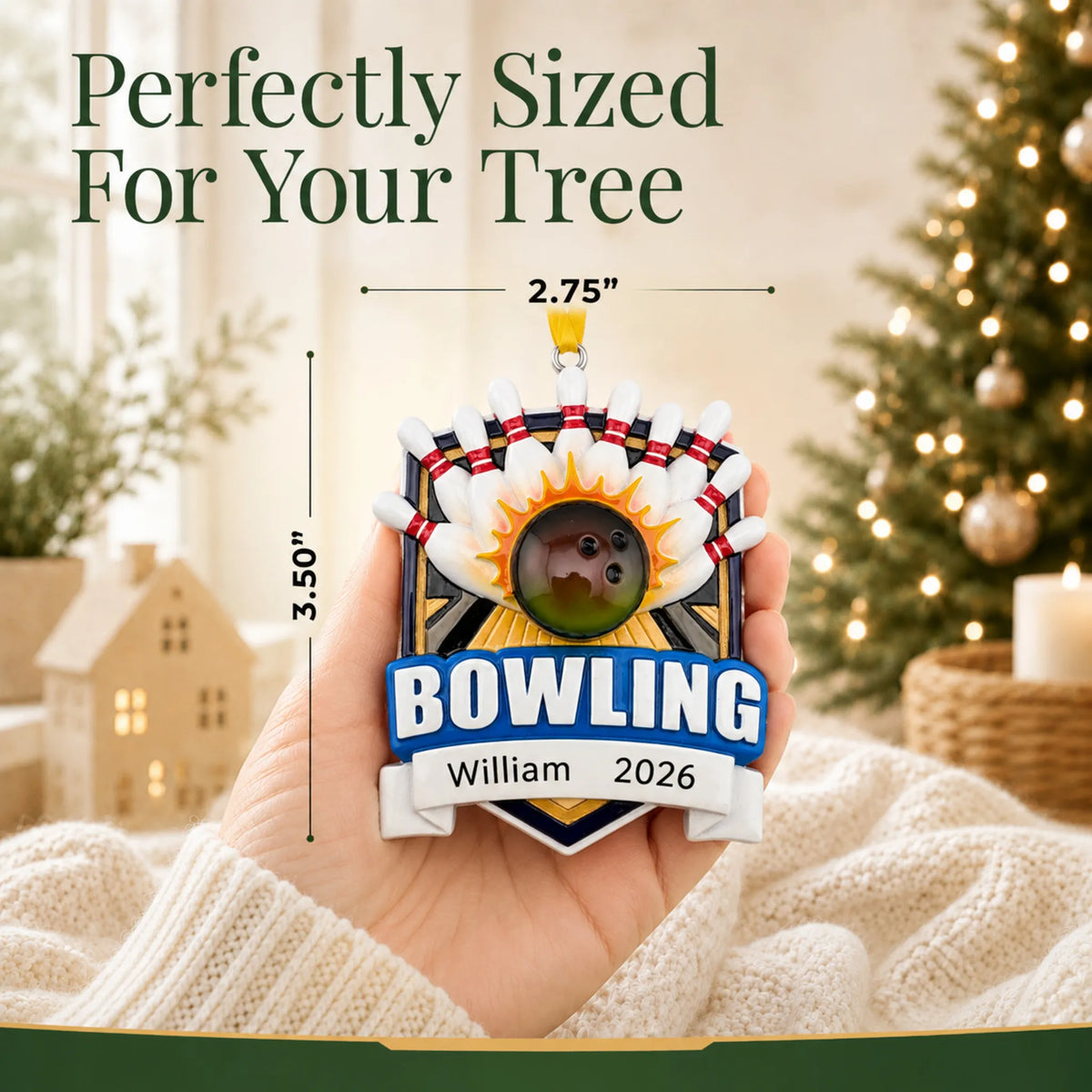 Size guide: the personalized bowling ball strike christmas ornament shown in hand next to a Christmas tree