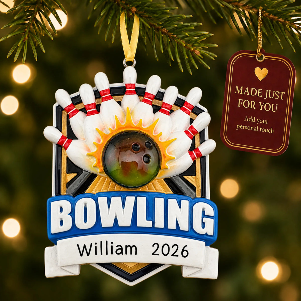 Bowling ball strike christmas ornament hanging on a lit Christmas tree with a Made Just For You gift tag