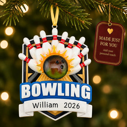 Bowling ball strike christmas ornament hanging on a lit Christmas tree with a Made Just For You gift tag