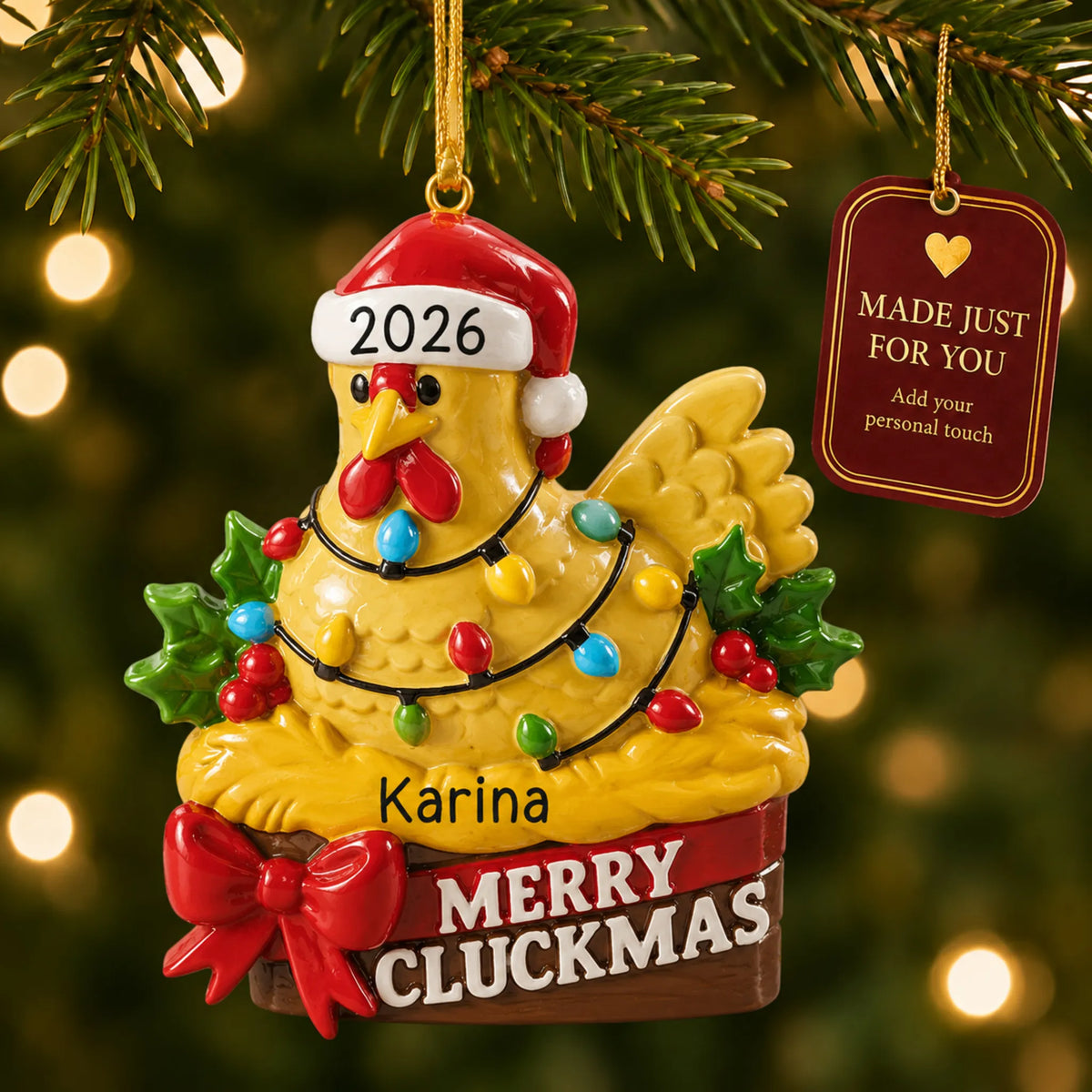 Merry cluckmas chicken christmas ornament hanging on a lit Christmas tree with a Made Just For You gift tag