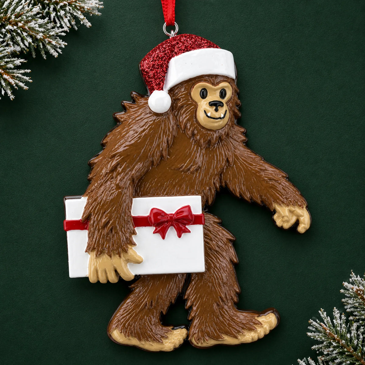 Personalized Yeti big foot christmas ornament on a dark green pine background