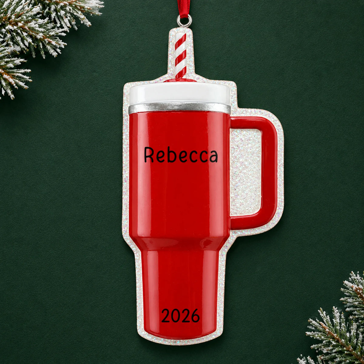 Personalized Red Tumbler Stanley Cup christmas ornament on a dark green pine background