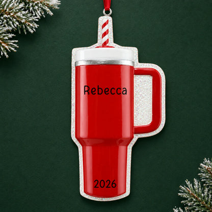 Personalized Red Tumbler Stanley Cup christmas ornament on a dark green pine background