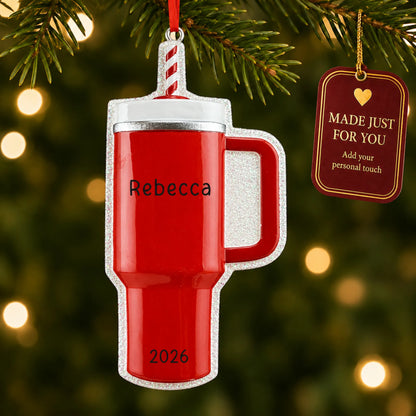 Red Tumbler Stanley Cup christmas ornament hanging on a lit Christmas tree with a Made Just For You gift tag