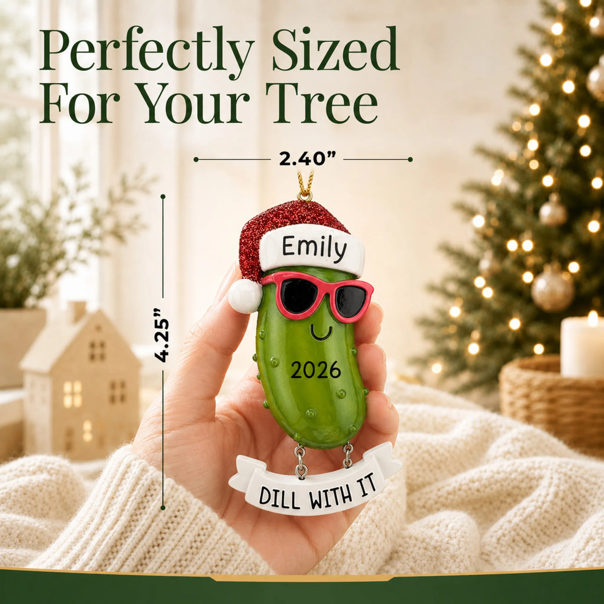 Size guide: the personalized Pickle christmas ornament is 2.40 in wide by 4.25 in tall, shown in hand