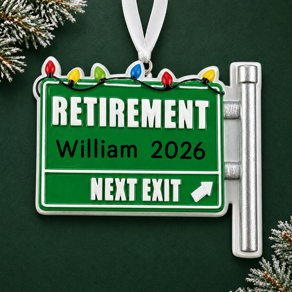 Personalized retirement christmas ornament on a dark green pine background