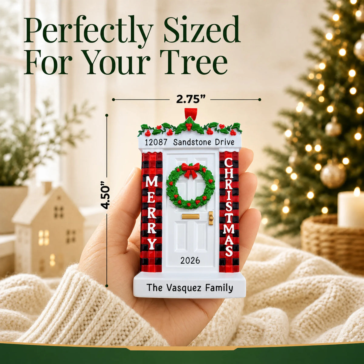 Size guide: the personalized Merry Christmas Door ornament is 2.75 in wide by 4.50 in tall, shown in hand