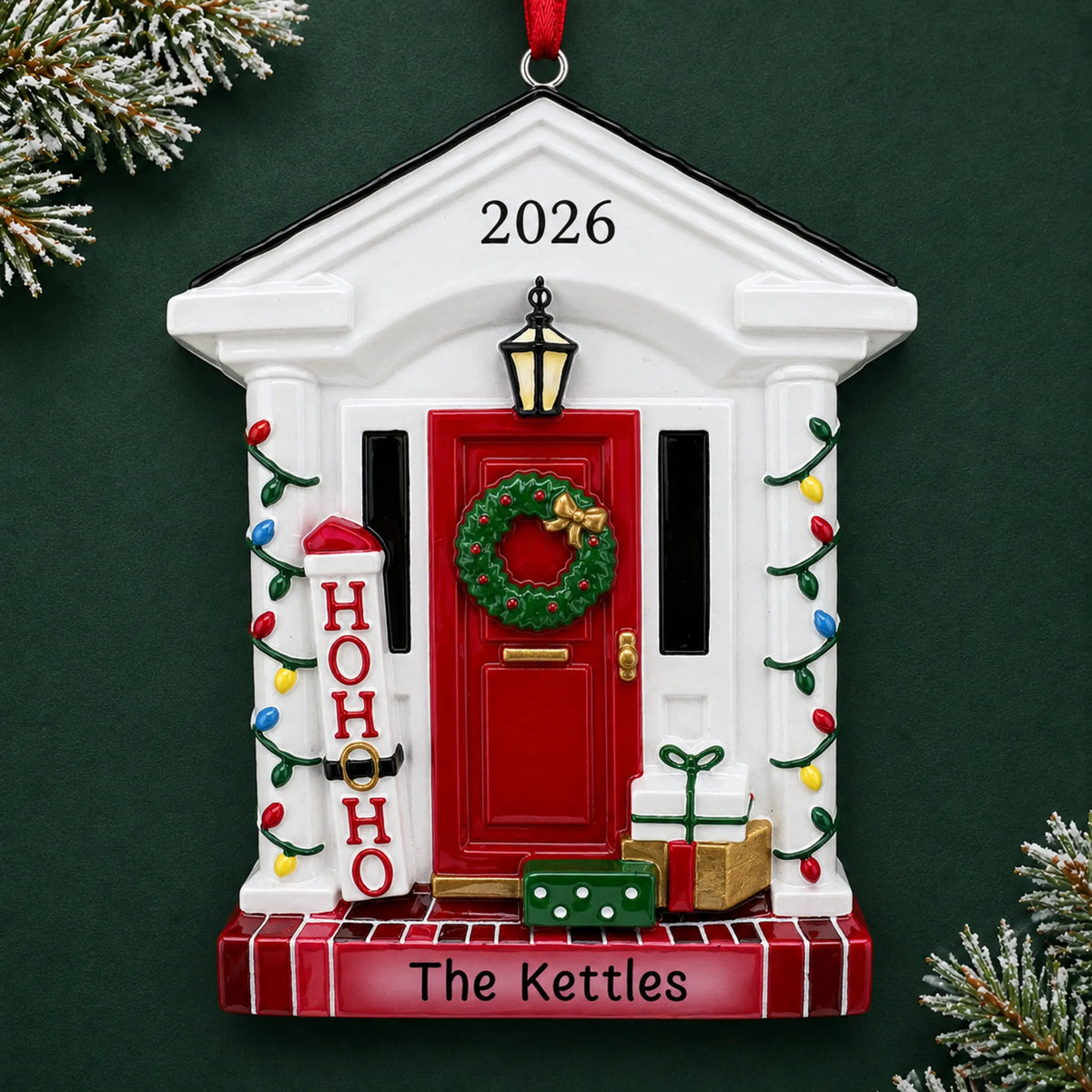 Personalized Holiday Front Door christmas ornament on a dark green pine background
