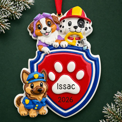 Personalized puppy rescue squad christmas ornament on a dark green pine background