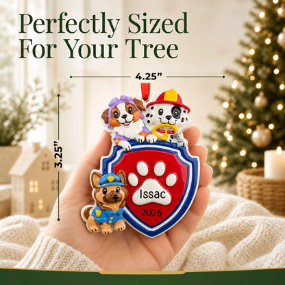 Size guide: the personalized puppy rescue squad christmas ornament is 4.25 in wide by 3.25 in tall, shown in hand