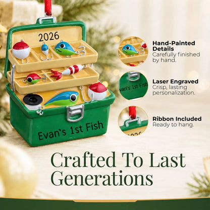 Hand-painted details and laser engraved personalization on the green fishing tackle box christmas ornament, ribbon included