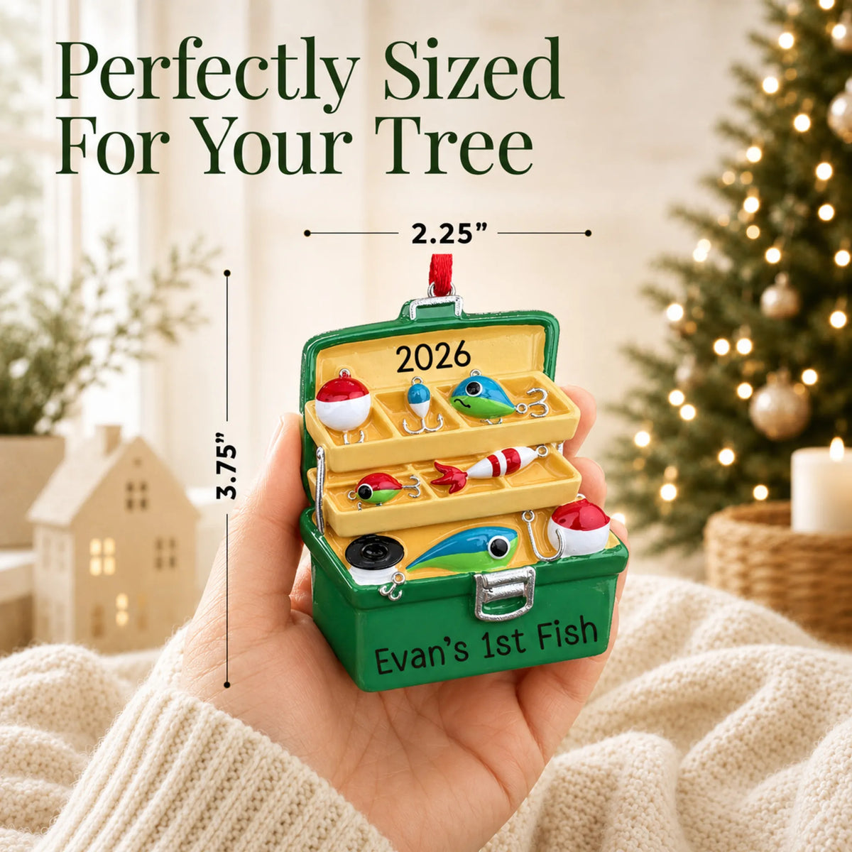 Size guide: the personalized green fishing tackle box christmas ornament shown in hand next to a Christmas tree
