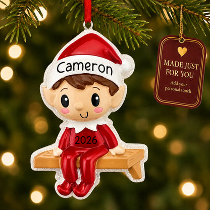Christmas Elf ornament hanging on a lit Christmas tree with a Made Just For You gift tag