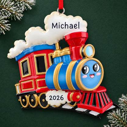 Personalized kids train christmas ornament on a dark green pine background