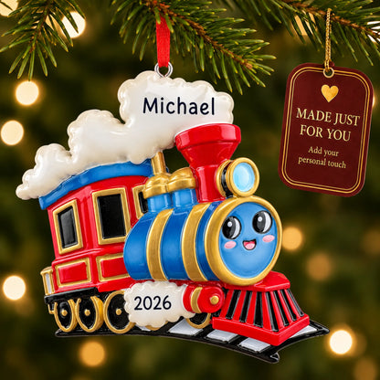 Kids train christmas ornament hanging on a lit Christmas tree with a Made Just For You gift tag