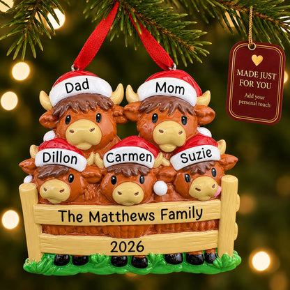 Highland cow family of 5 christmas ornament hanging on a lit Christmas tree with a Made Just For You gift tag