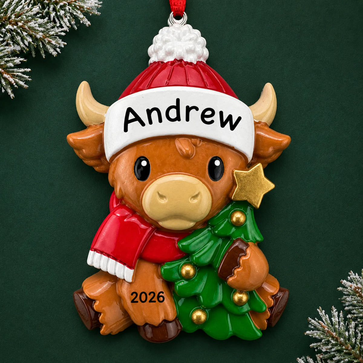 Personalized highland baby cow christmas ornament on a dark green pine background