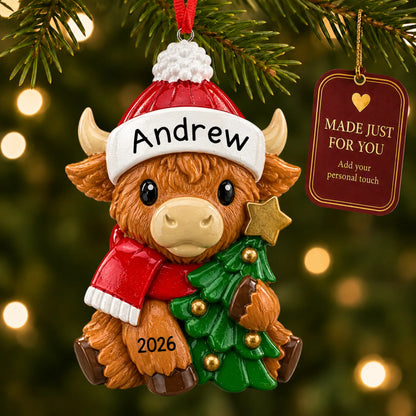 Highland baby cow christmas ornament hanging on a lit Christmas tree with a Made Just For You gift tag
