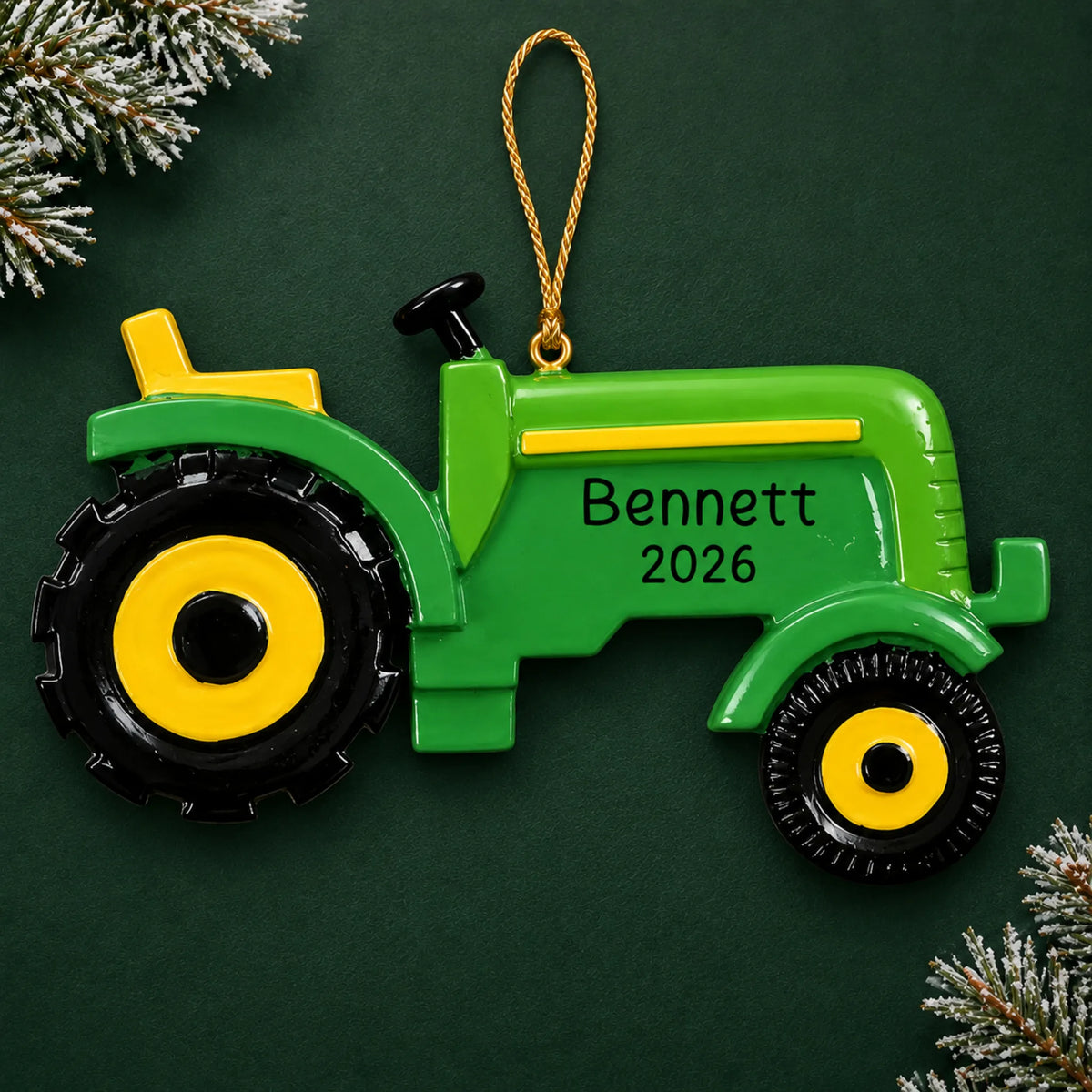 Personalized farm tractor christmas ornament on a dark green pine background