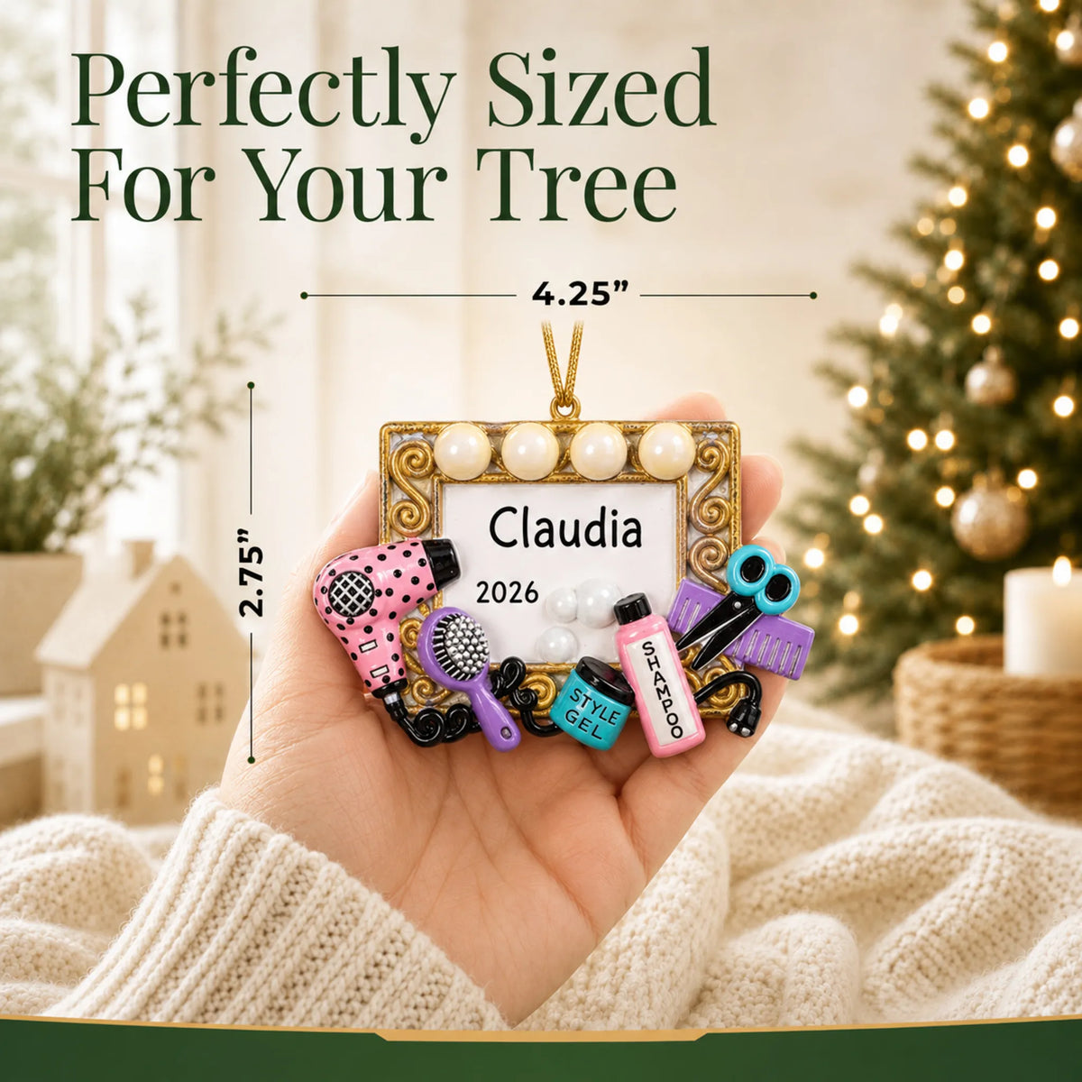 Size guide: the personalized hair stylist christmas ornament is 4.25 in wide by 2.75 in tall, shown in hand