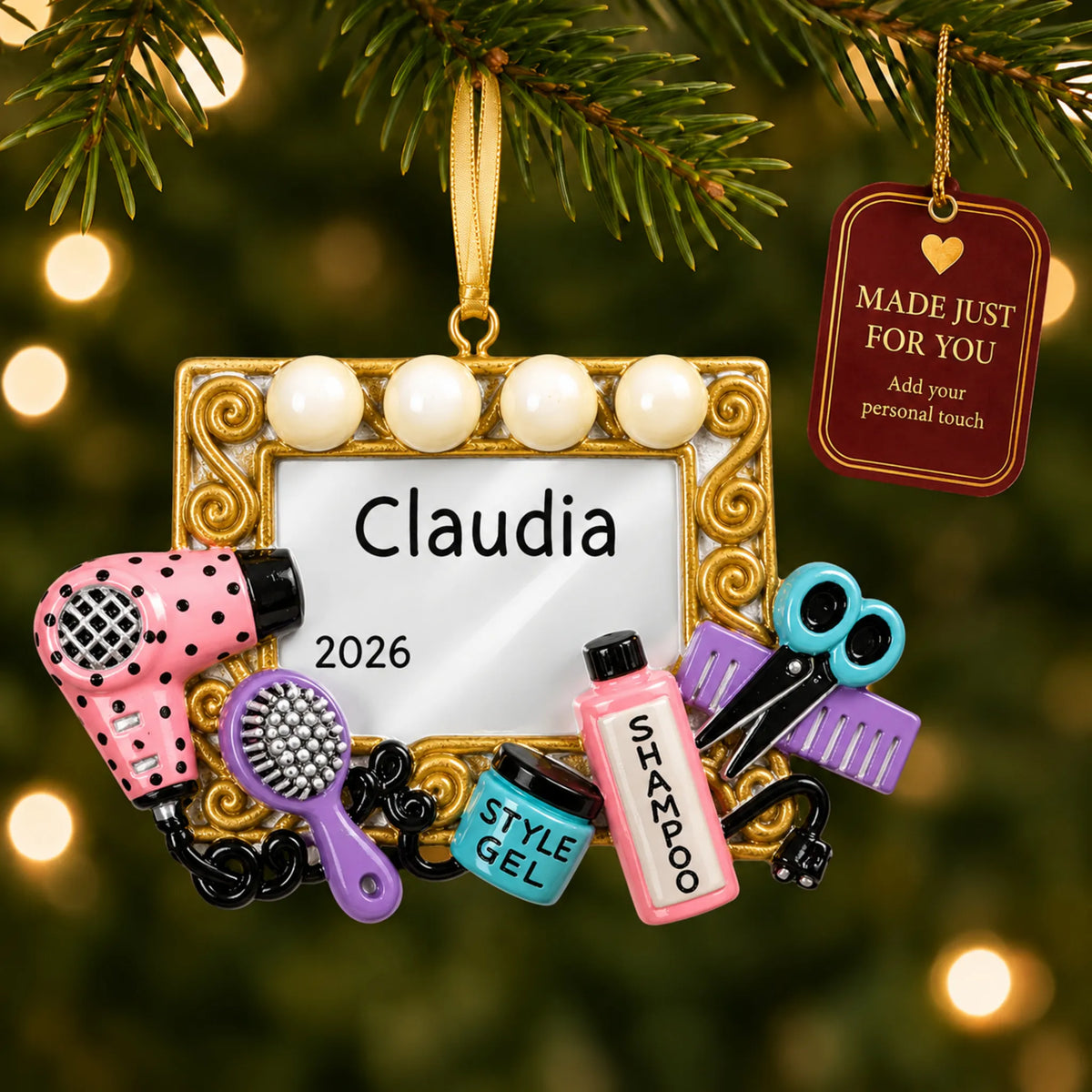 Hair stylist christmas ornament hanging on a lit Christmas tree with a Made Just For You gift tag