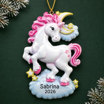 Personalized unicorn sparkles christmas ornament on a dark green pine background