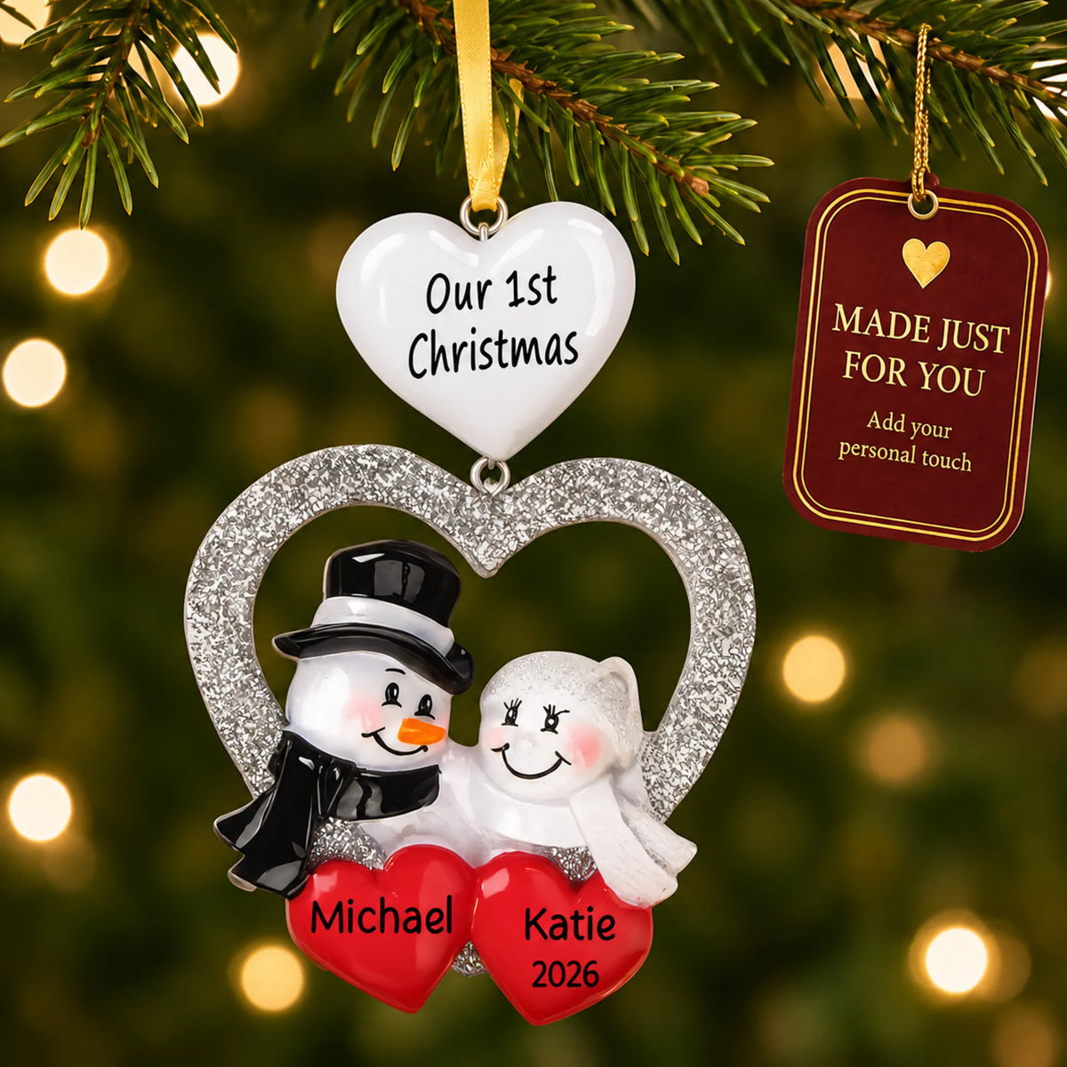 Wedding Couple First Christmas ornament hanging on a lit Christmas tree with a Made Just For You gift tag