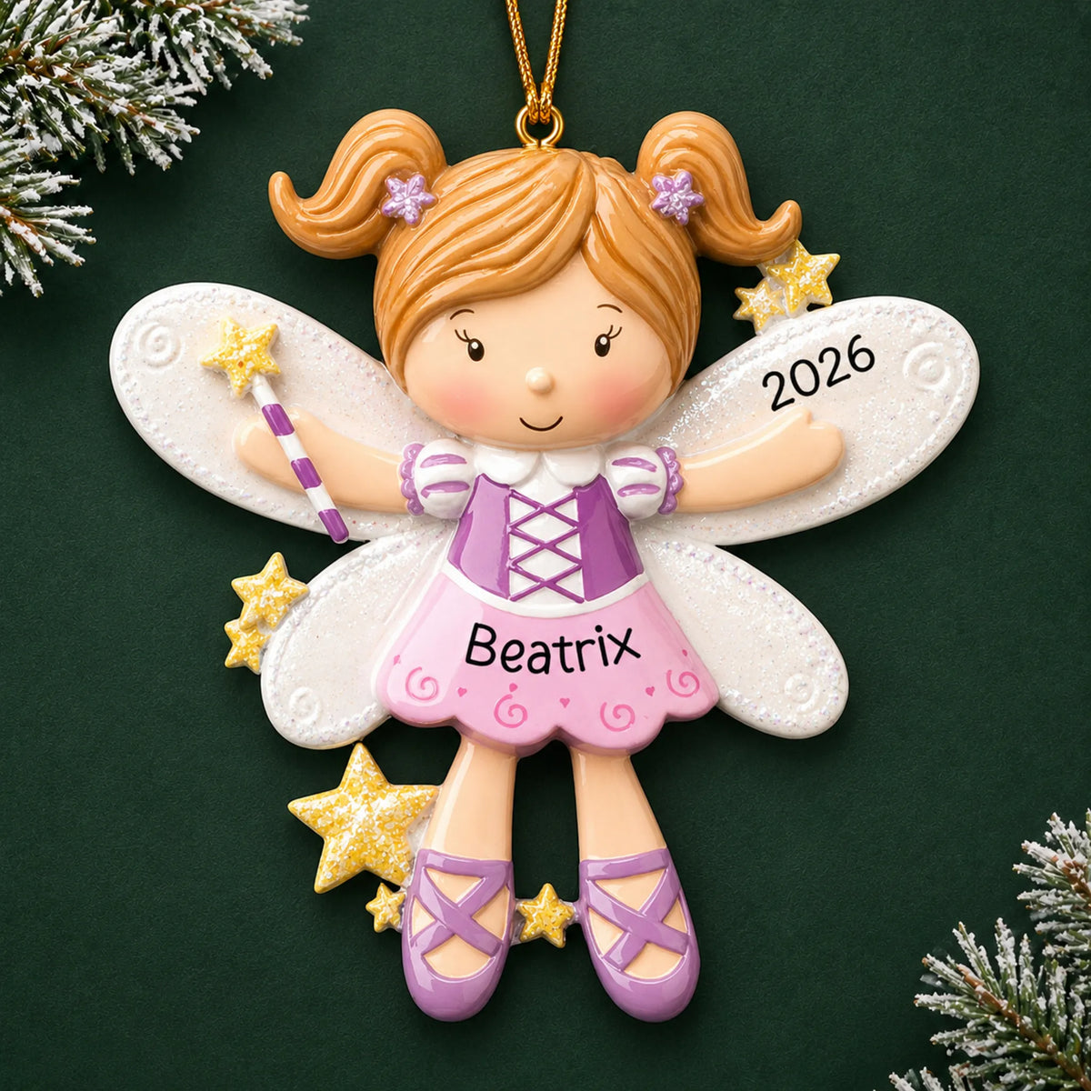 Personalized fairy christmas ornament on a dark green pine background