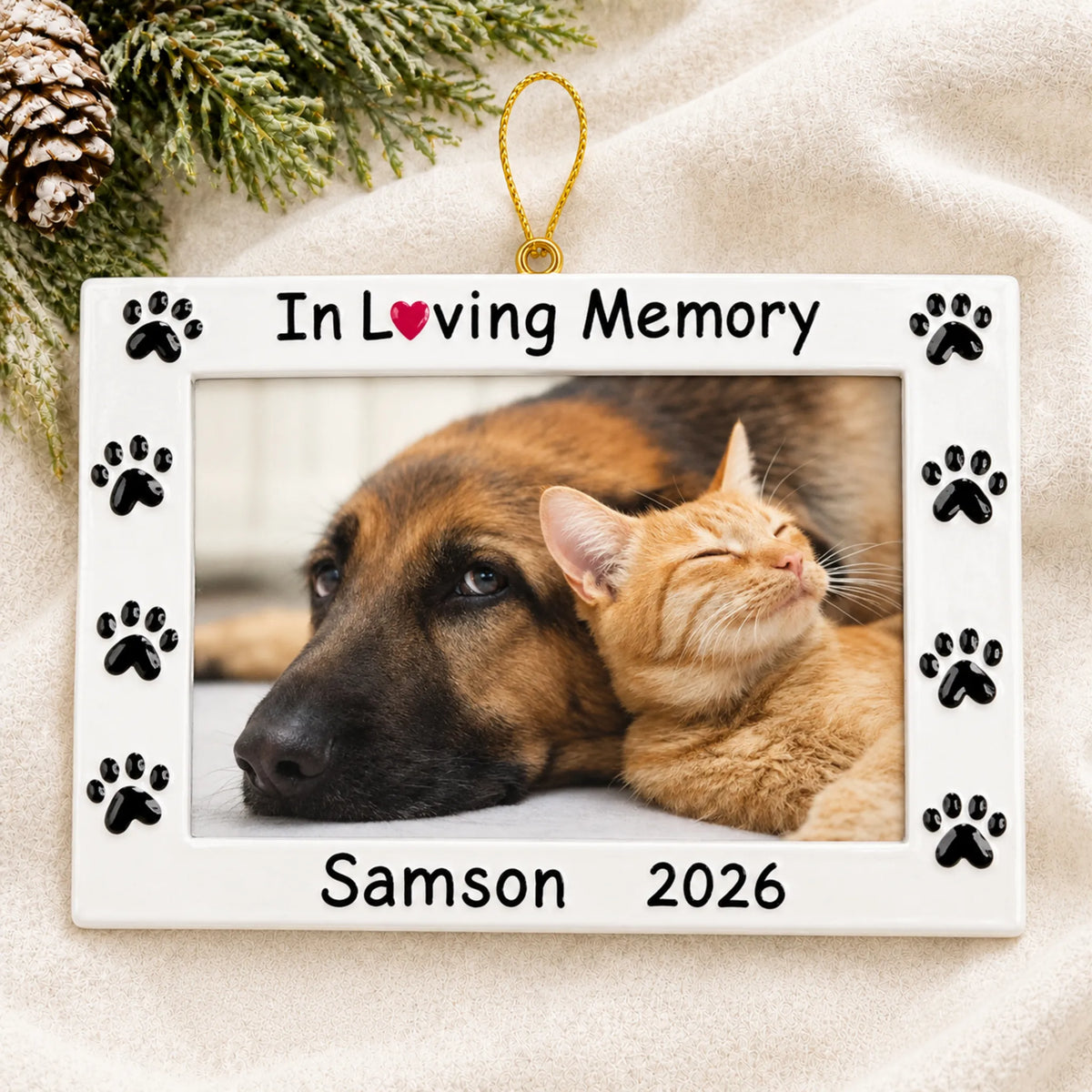 Personalized Pet In Loving Memory Photo Frame christmas ornament laid on a soft white knit blanket