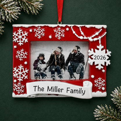 Personalized Red Photo Frame christmas ornament on a dark green pine background