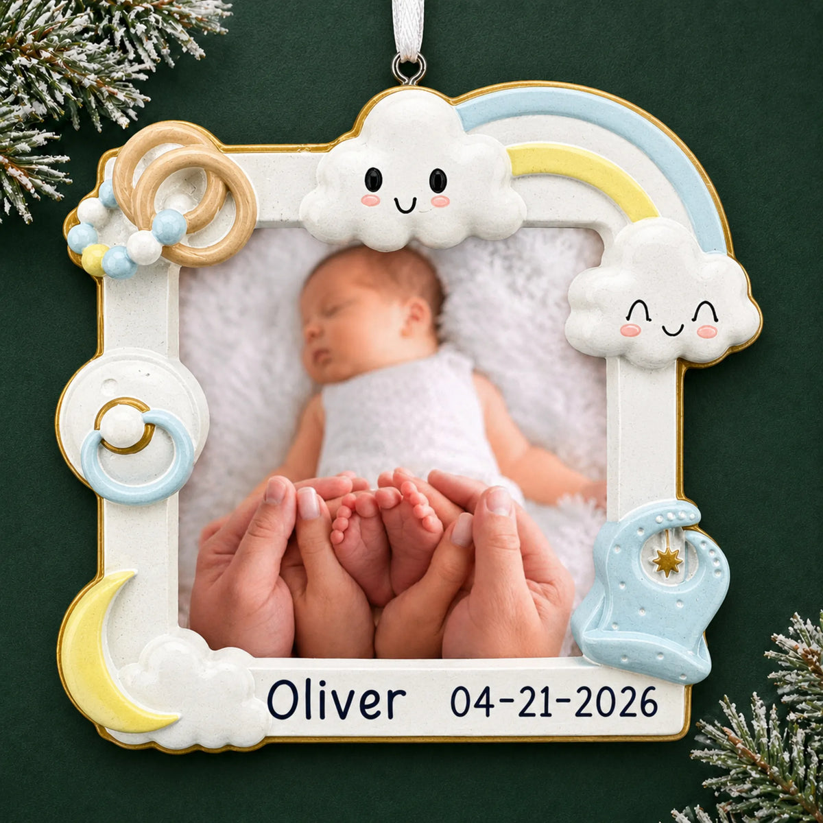 Personalized baby boy photo frame christmas ornament on a dark green pine background