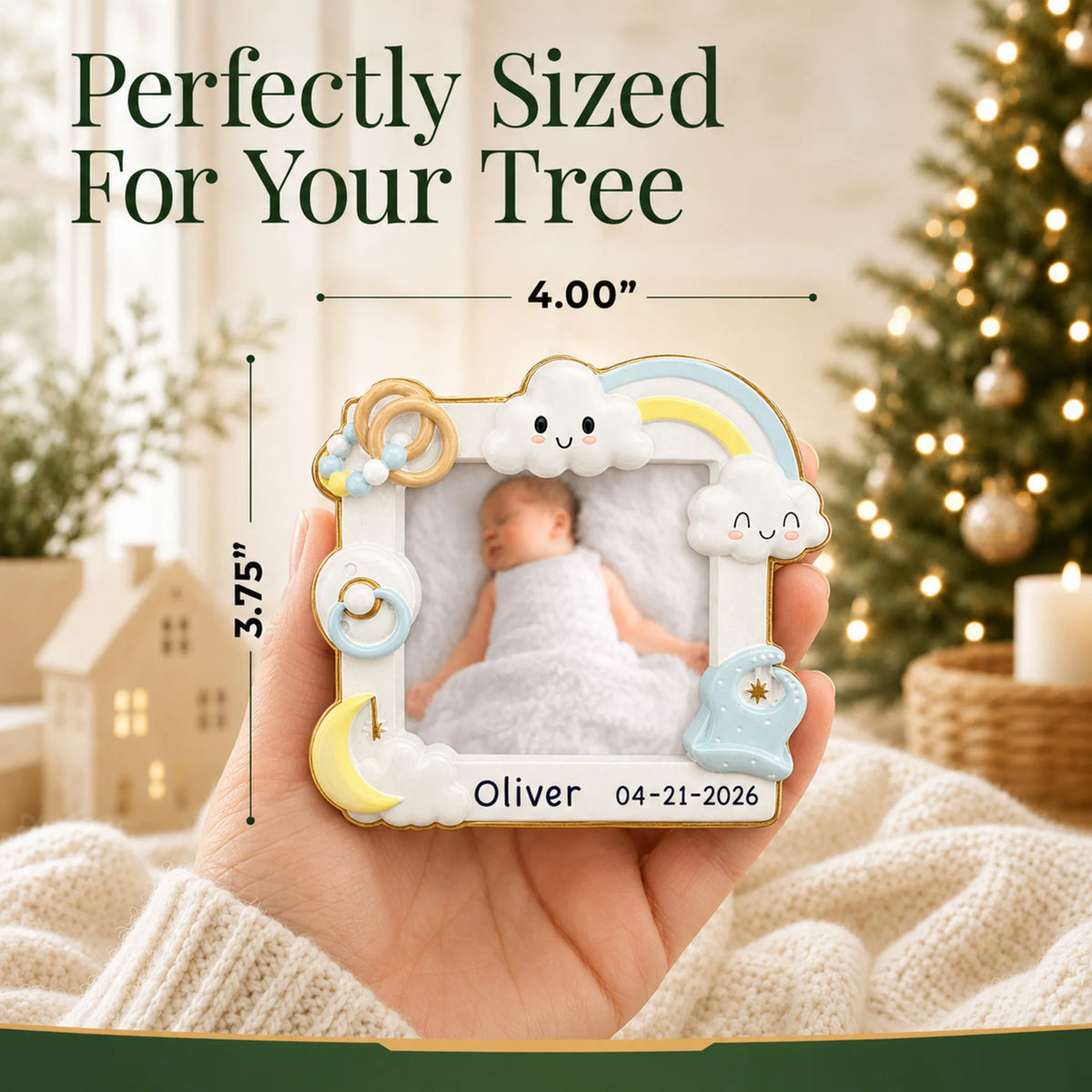 Size guide: the personalized baby boy photo frame christmas ornament is 4.00 in wide by 3.75 in tall, shown in hand