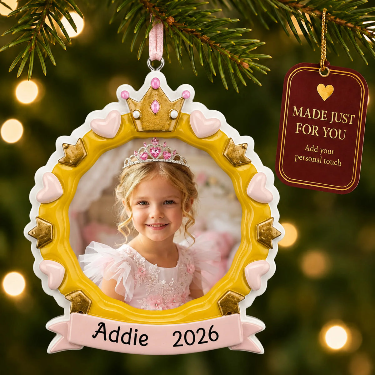 Princess crown photo frame christmas ornament hanging on a lit Christmas tree with a Made Just For You gift tag